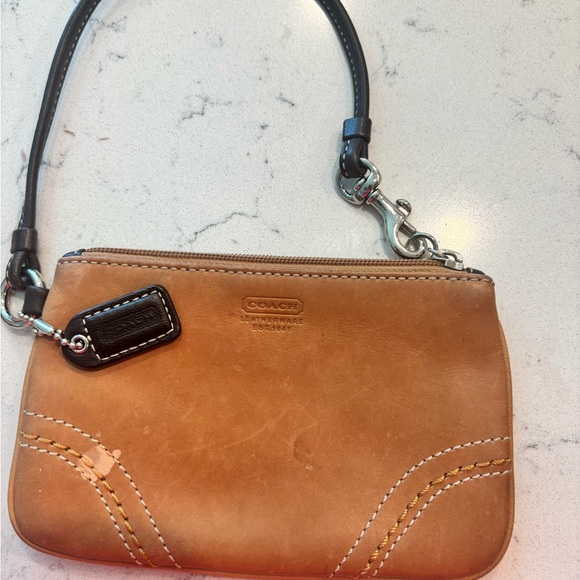 Coach Handbags - Coach Brown Leather Wristlet with Black Strap